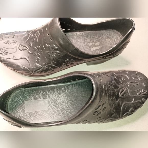 Elegance in Every Step: Embossed Floral Black Clogs by Dansko (#1,230) - Picture 5 of 6